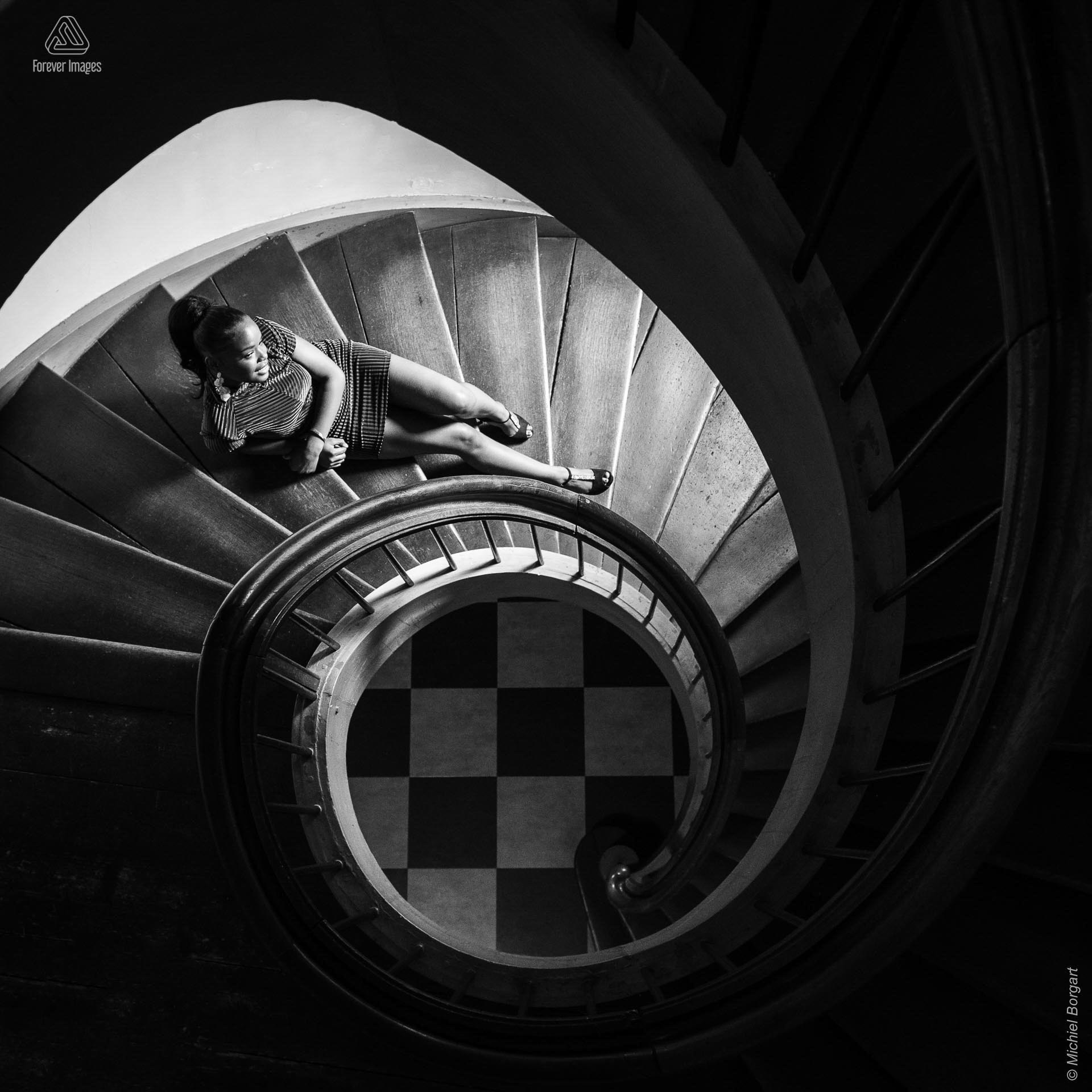 Portrait photo black and white B&W old spiral staircase | Mariangel Dolorita Koepelkerk Amsterdam | Portrait Photographer Michiel Borgart - Forever Images.